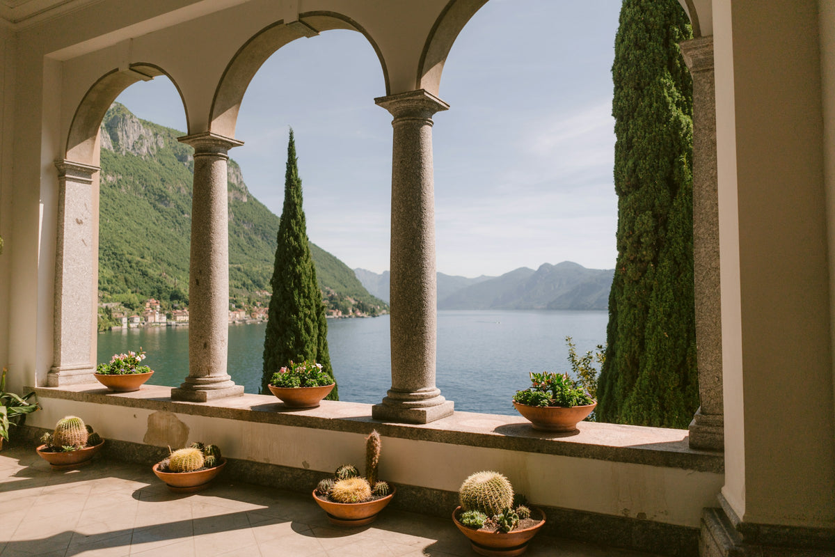 Arched Italian loggia overlooking the lake