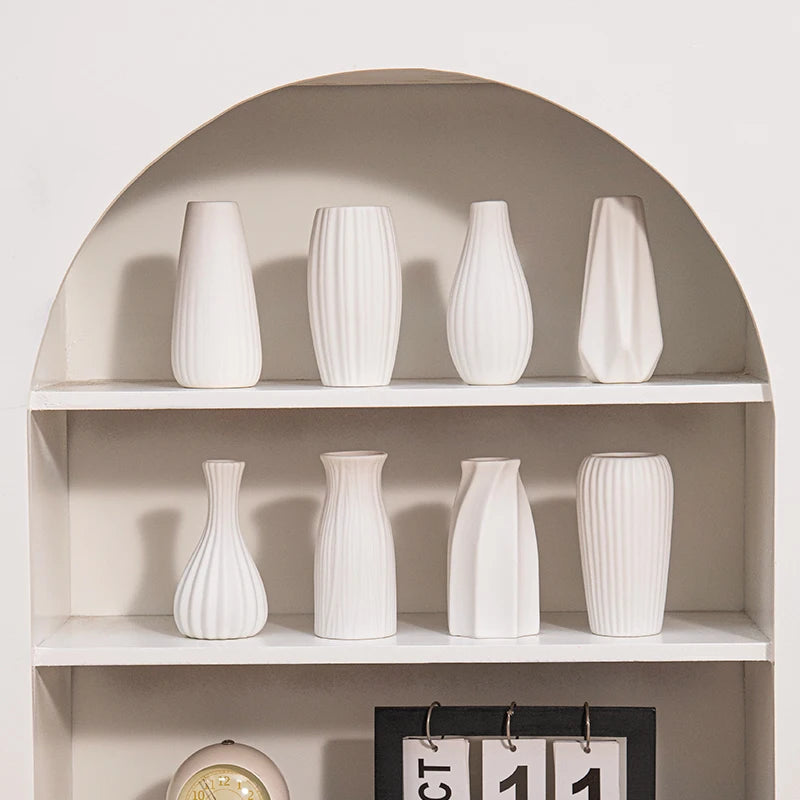 A collection of Bianca vases on a shelf