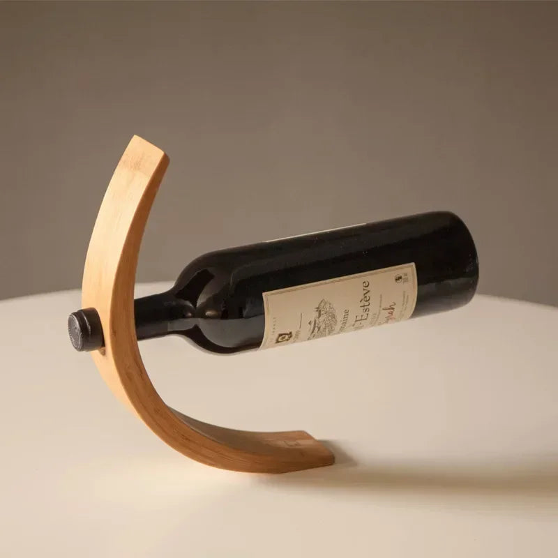 Bilico wooden holder balancing a wine bottle