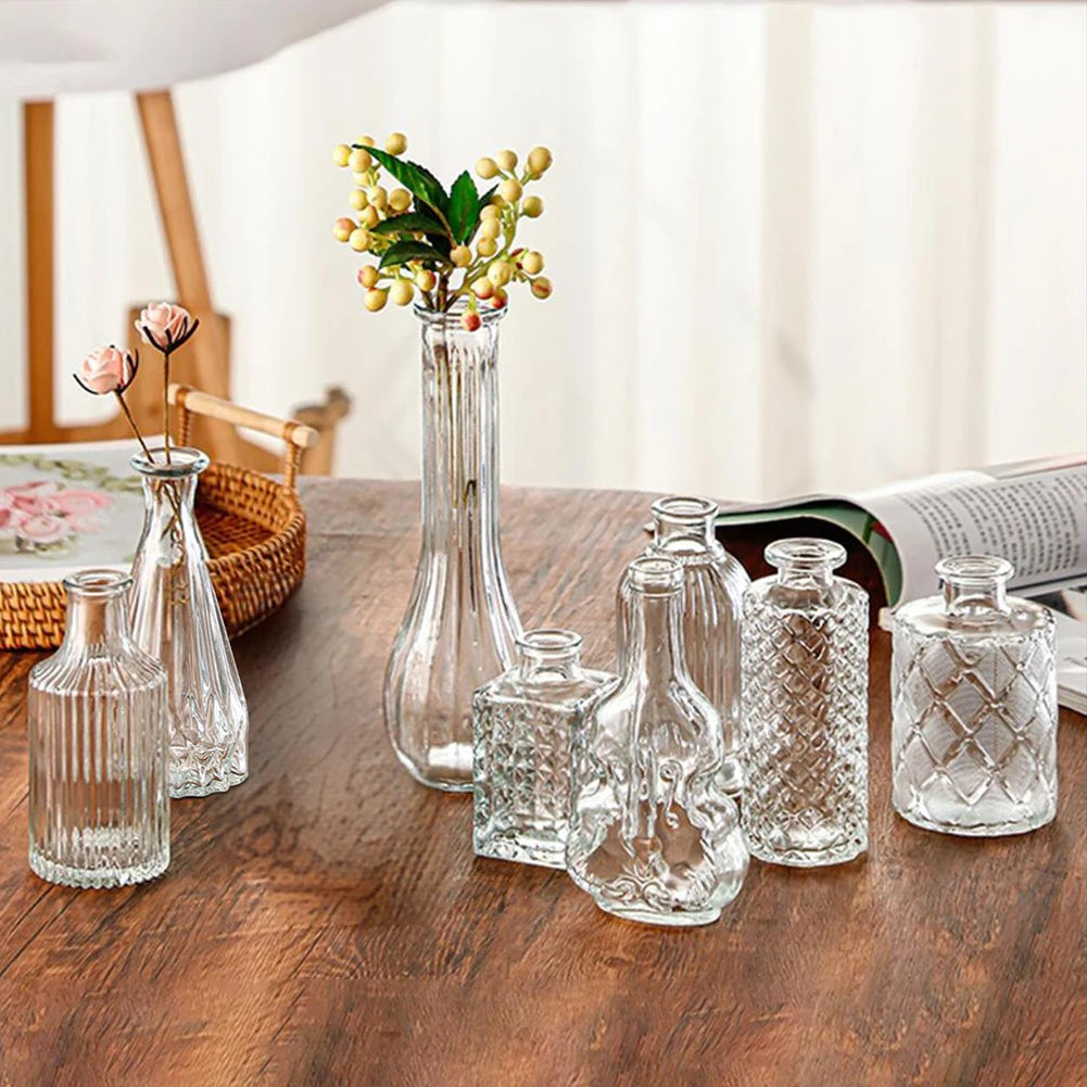 Bottega vases grouped on a wooden table