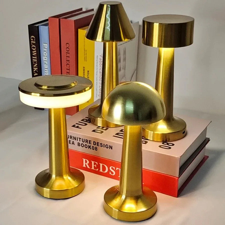 Brera mini metal lamps on books