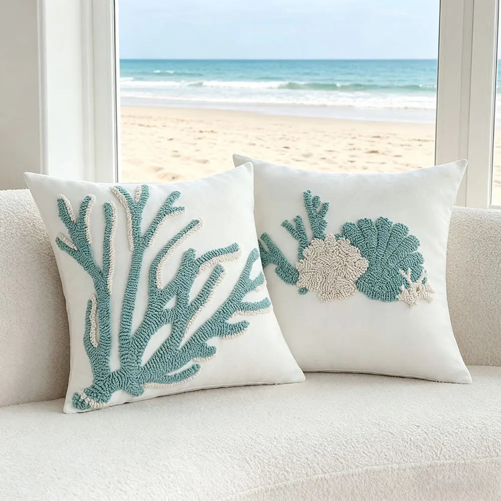 Corallo coral and shell cushions on a sofa