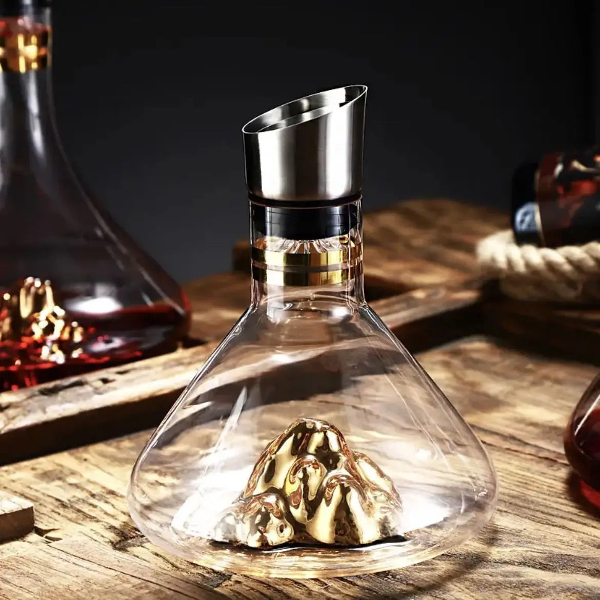 Dolomiti iceberg decanter with Gold Peak on a wooden bar