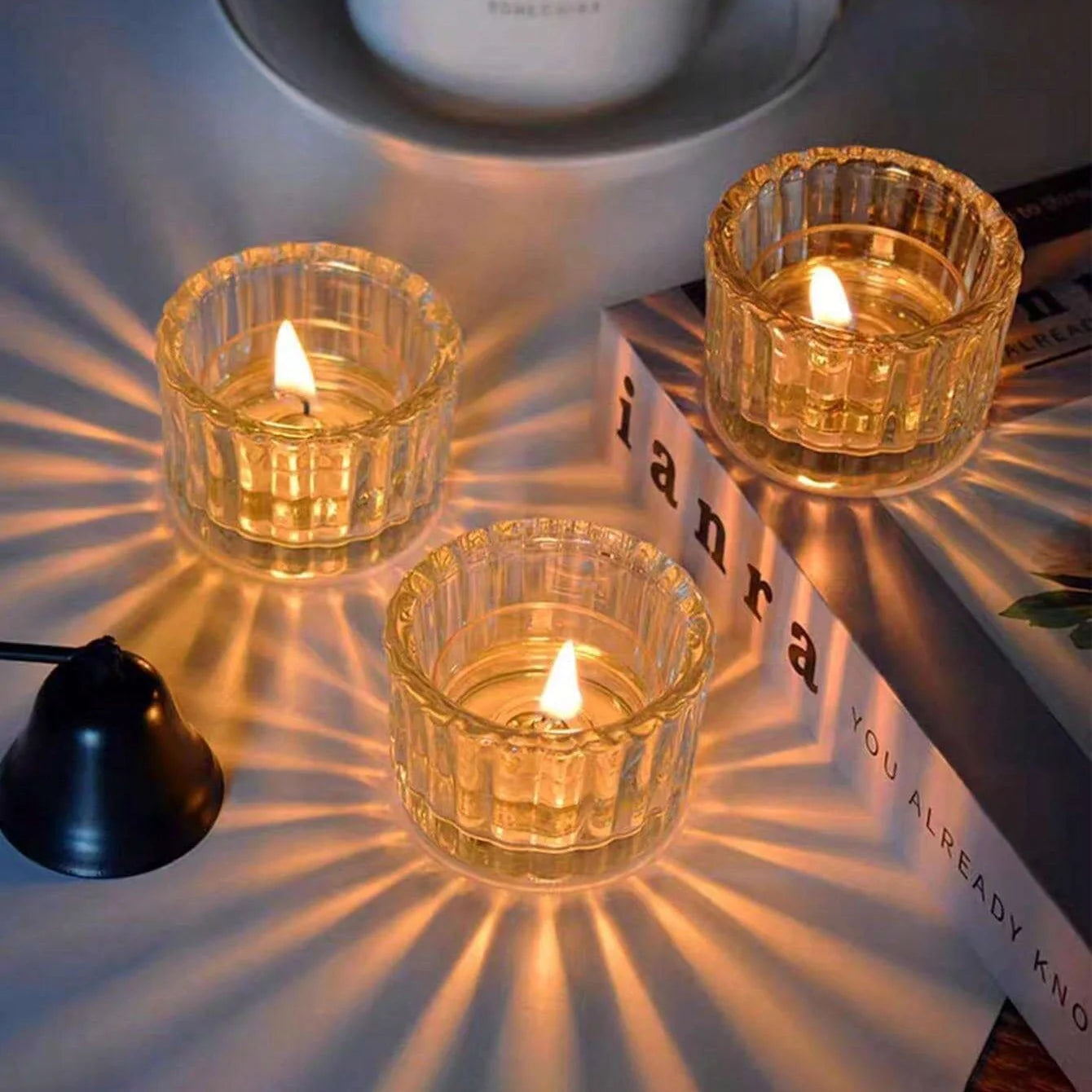 Fiamma tealight holders glowing