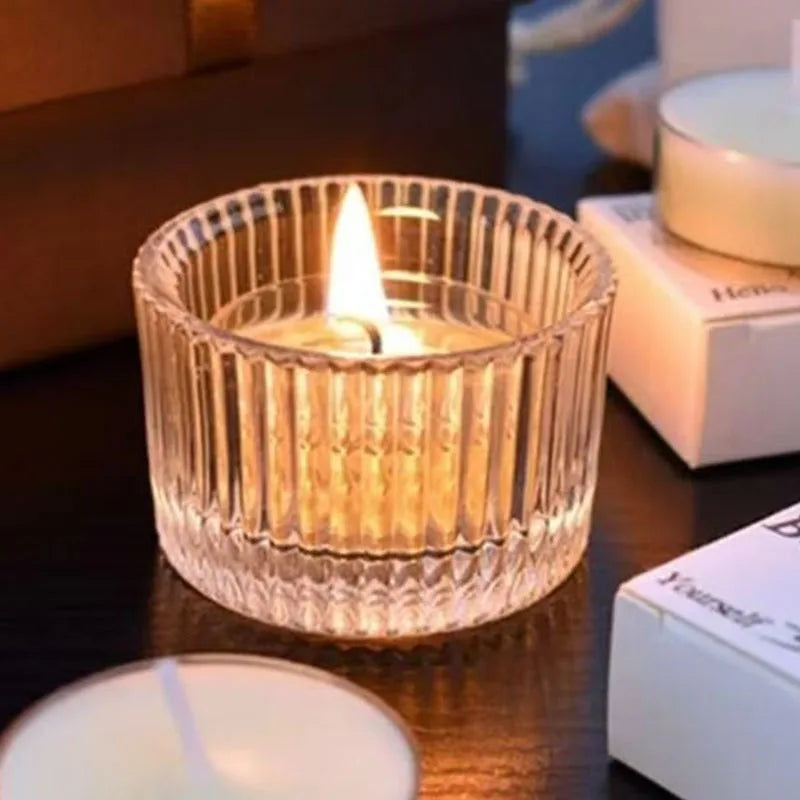 Lumino ribbed glass tealight holder glowing