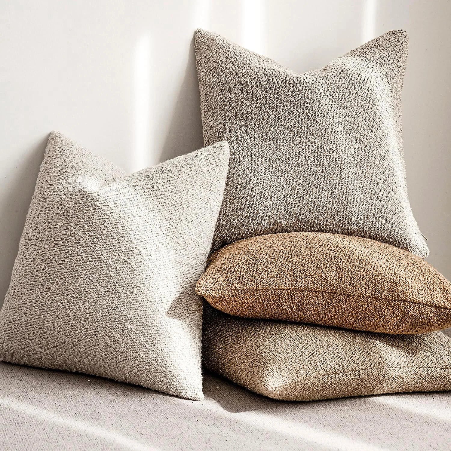 Morbido bouclé cushions in neutral tones