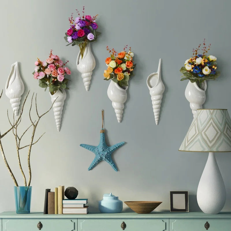 Group of Nautilo shell wall vases