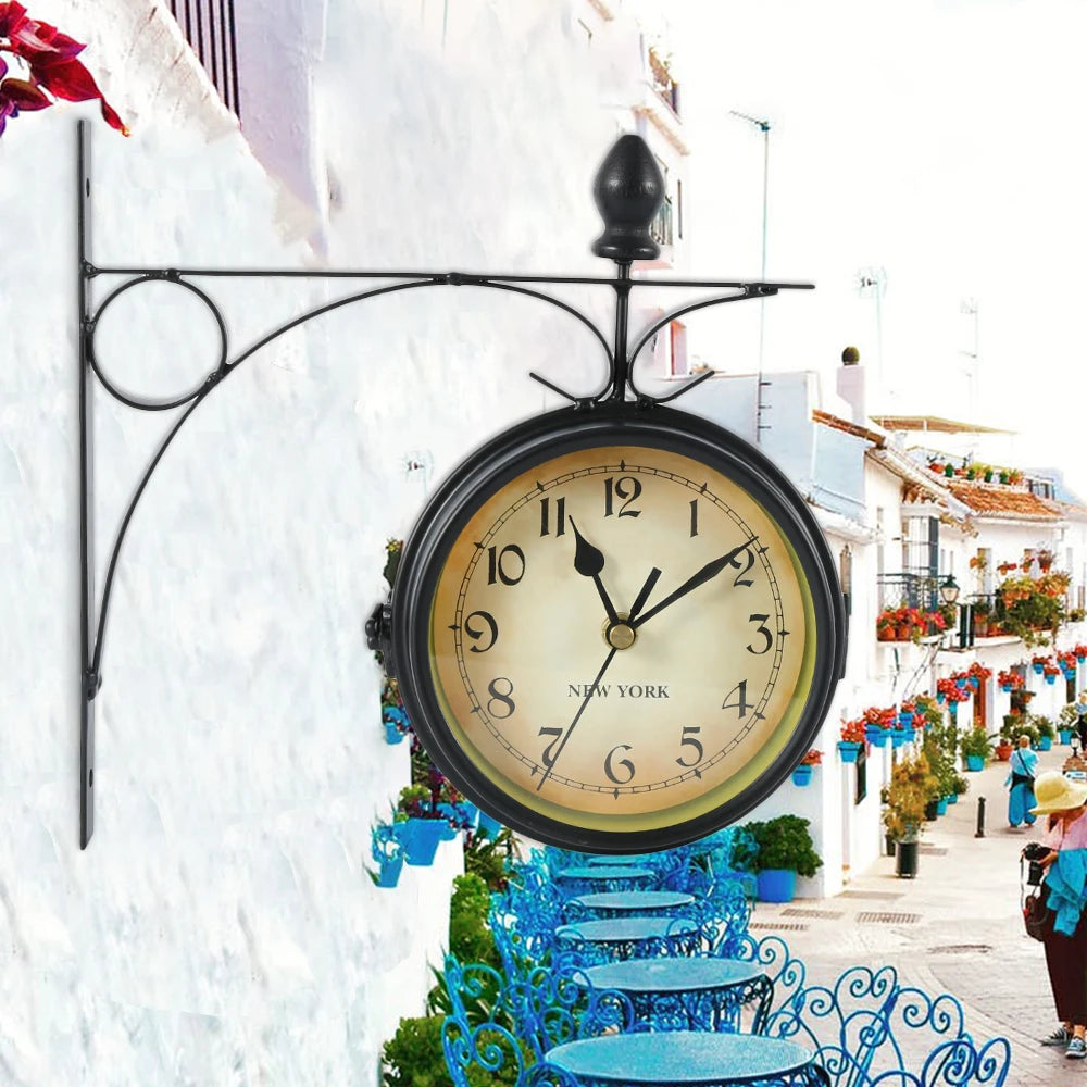 Stazione clock on a white wall